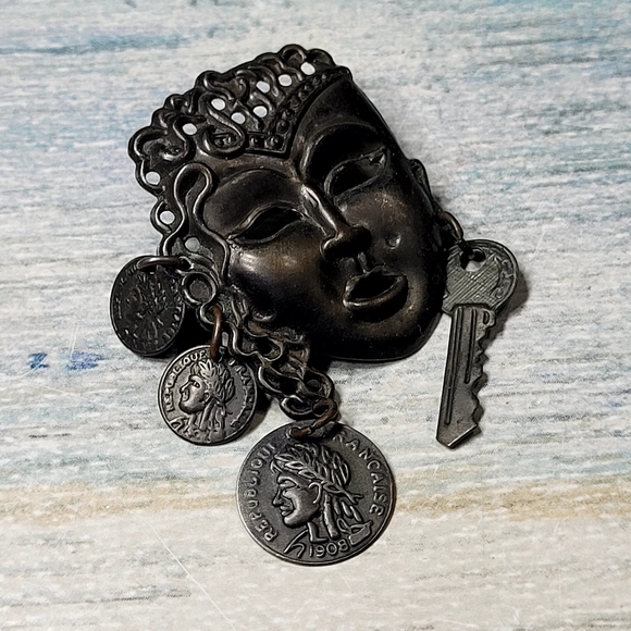 Unique Silver Metalic Mask Earrings with Key and Coin Accents - Picture 3 of 6